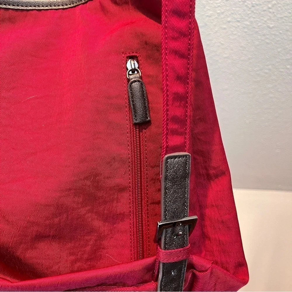 CORTILE FABRIC BACKPACK. Adj Straps. Front Flap Pocket w/snap & zipper pocket